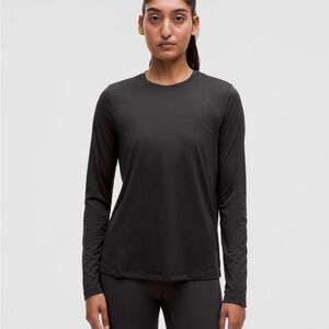 Lululemon Black Long Sleeve Ultralight Hip Length Women's Top
NWT
Size 8